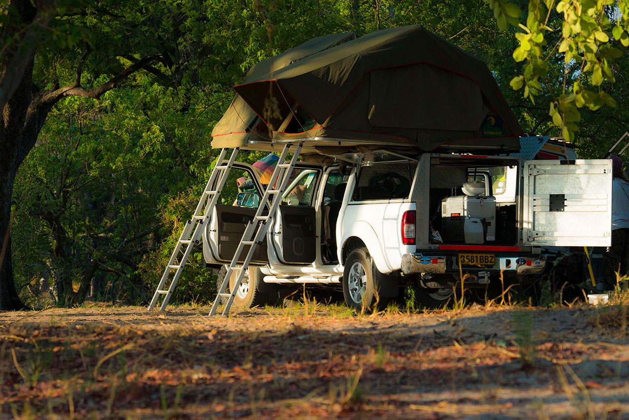 McKenzie 4x4 vehicle in campsite